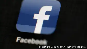 Facebook icon on a smartphone screen