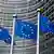 Флаги Евросоюза перед зданием Европейской комиссии в Брюсселе