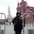 Полицейский у заграждения перед Красной площадью 