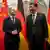 O Presidente chinês Xi Jinping (à dir.) recebeu hoje o chanceler alemão, Olaf Scholz, em Pequim